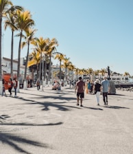 people walking on gray concrete road during daytime