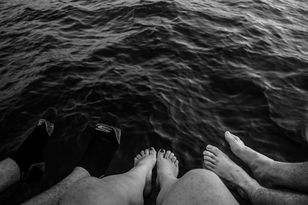 persons feet on water