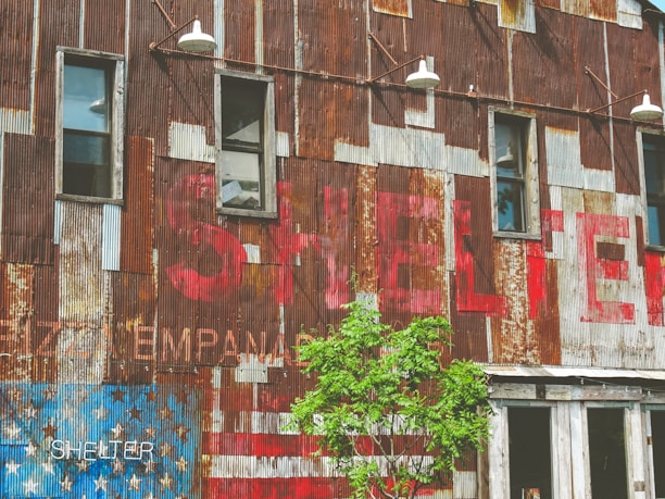 Close-up of a veteran-owned business sign on a construction office trailer.
