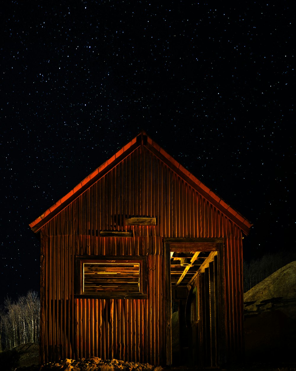 brown wooden house during night time