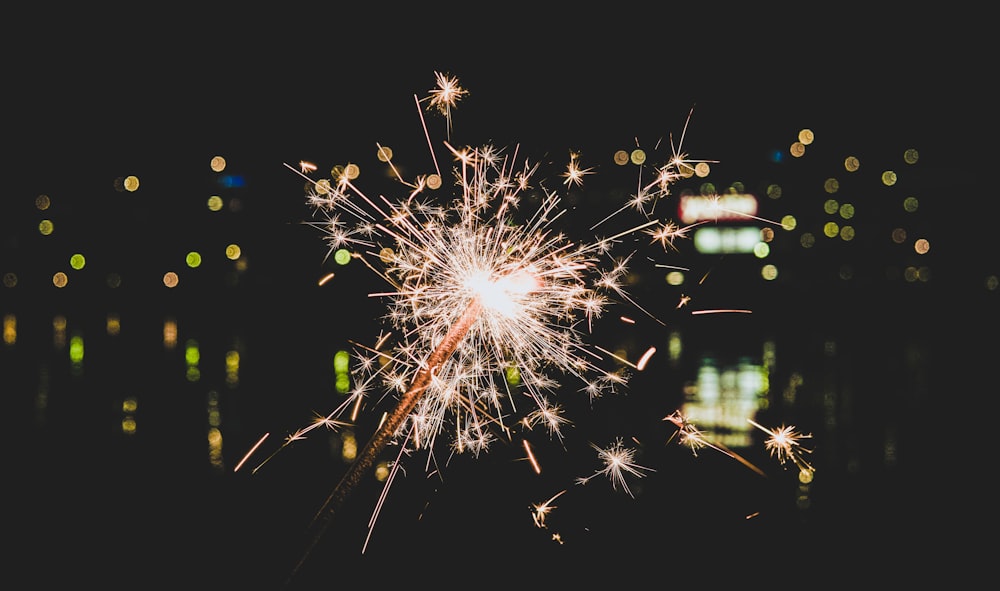 yellow and red fireworks display during night time