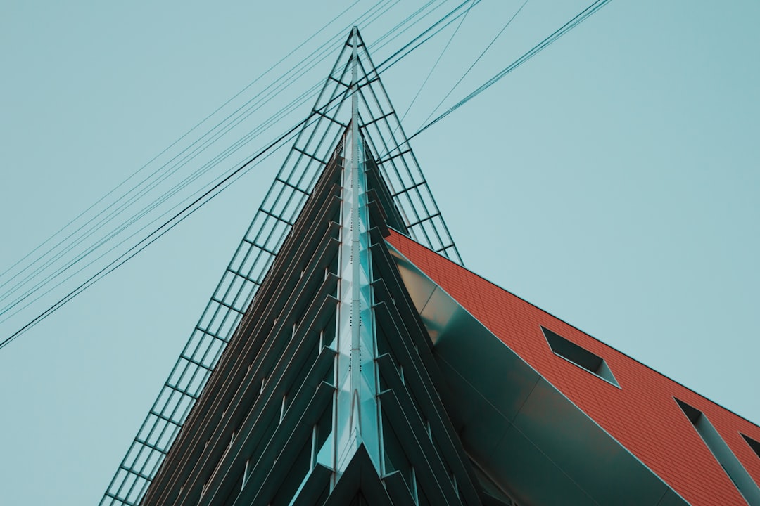 low angle photography of brown and gray concrete building