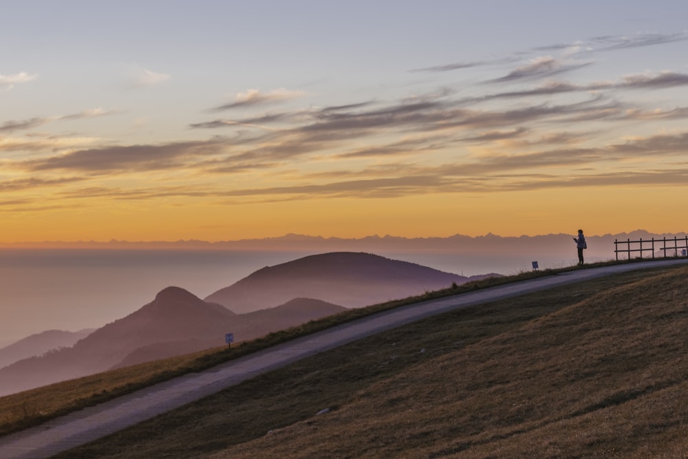 silhouette of mountains during sunset