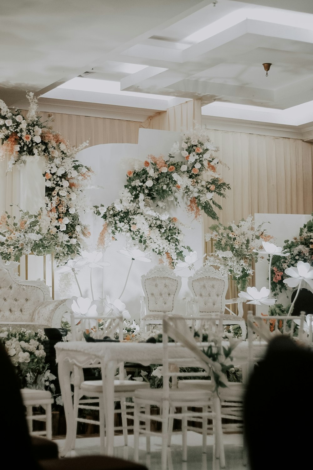 white wooden table with chairs