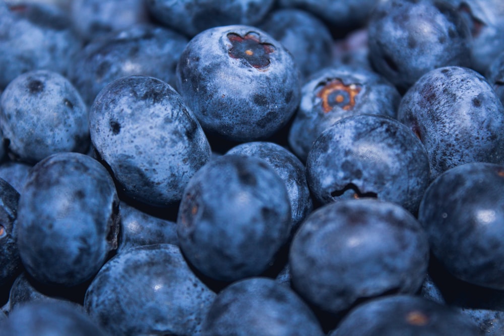 black round fruits in close up photography