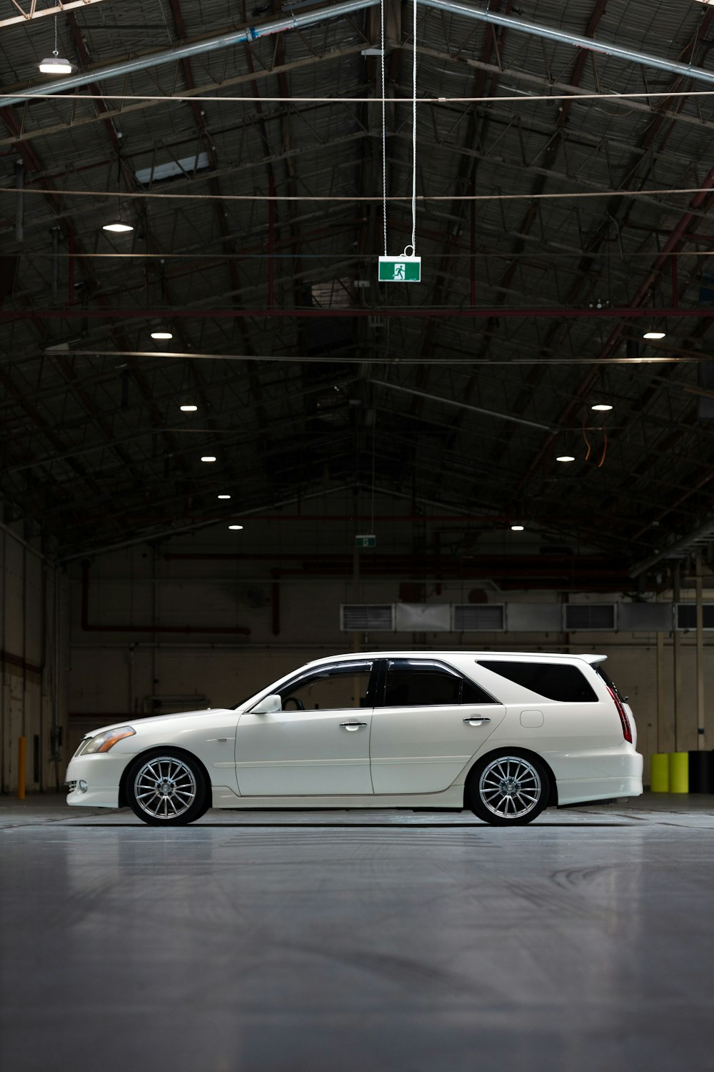 white suv in a parking lot