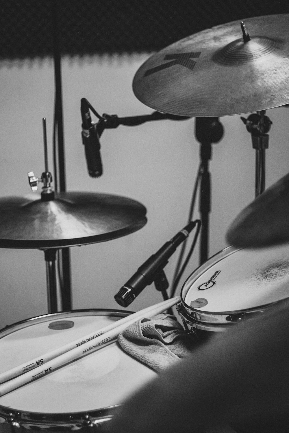 grayscale photo of drum set