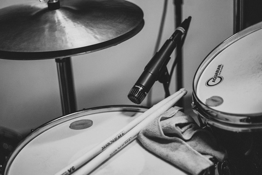 grayscale photo of drum set