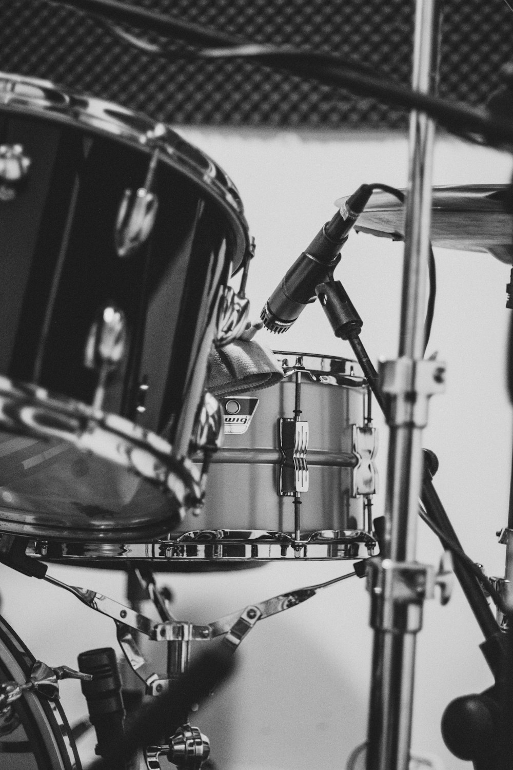 grayscale photo of drum set