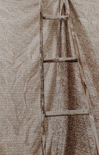 A beautifully designed blanket rack and ladder displayed in a serene space.