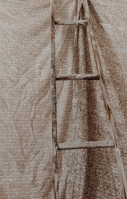 A beautifully designed blanket rack and ladder displayed in a serene space.