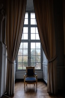 white wooden framed glass window