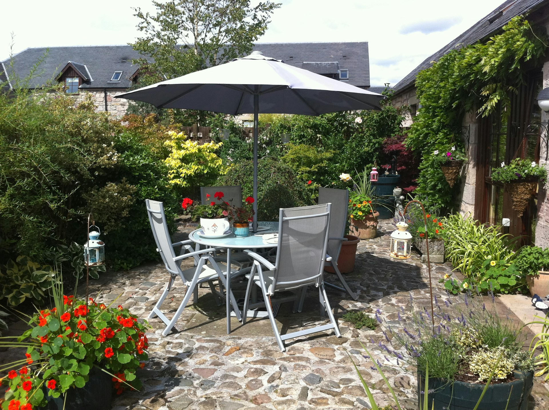 woman wearing yellow long-sleeved dress under white clouds and blue sky during daytime