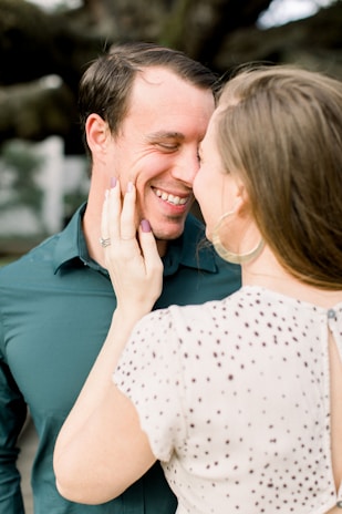 A couple sharing a heartfelt moment with their custom video message.