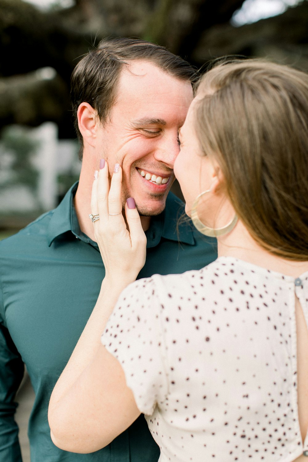 woman in white and black polka dot shirt