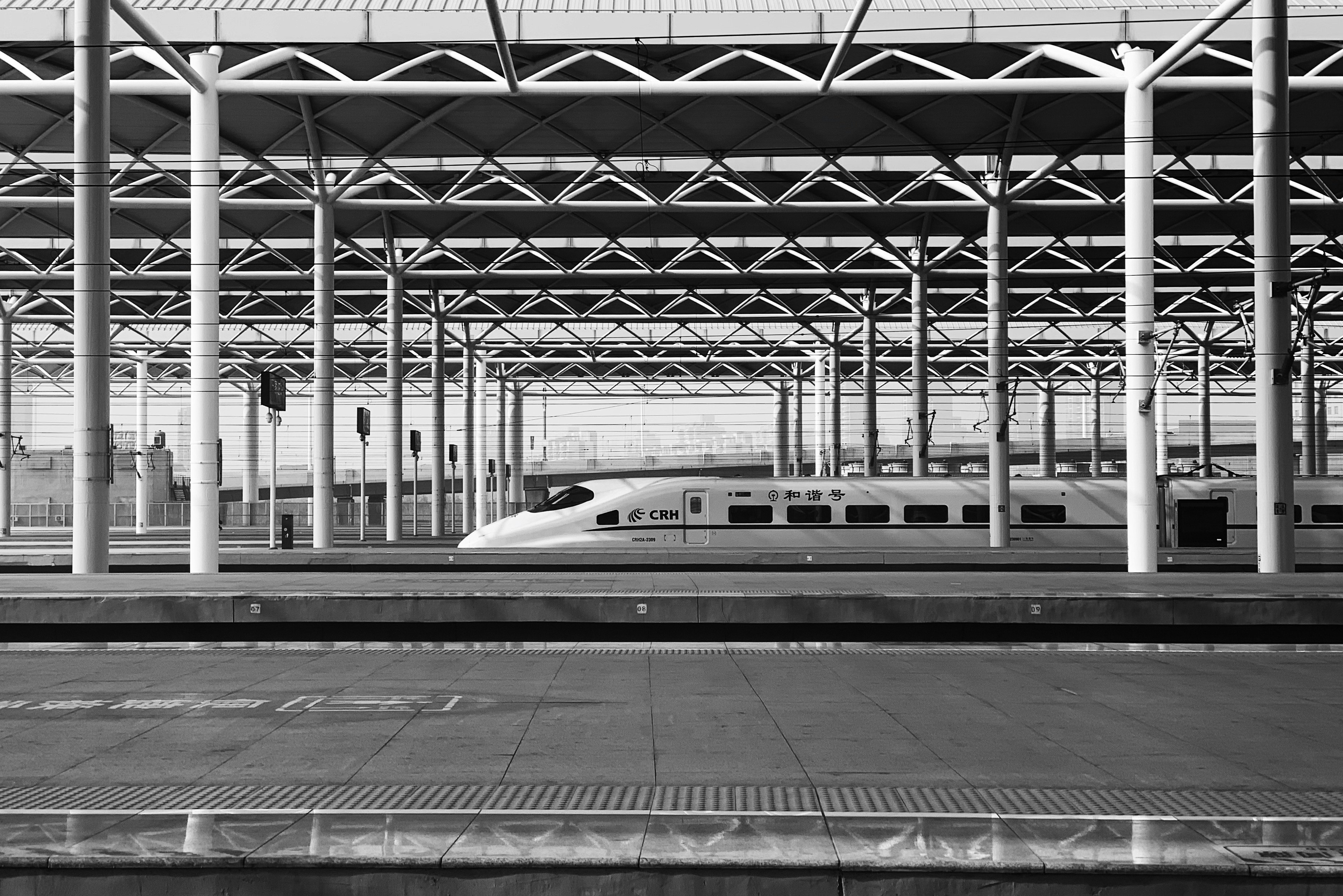 grayscale photo of train station