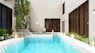 swimming pool near green trees during daytime