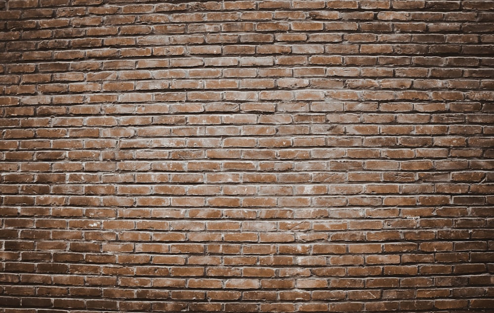 brown brick wall during daytime