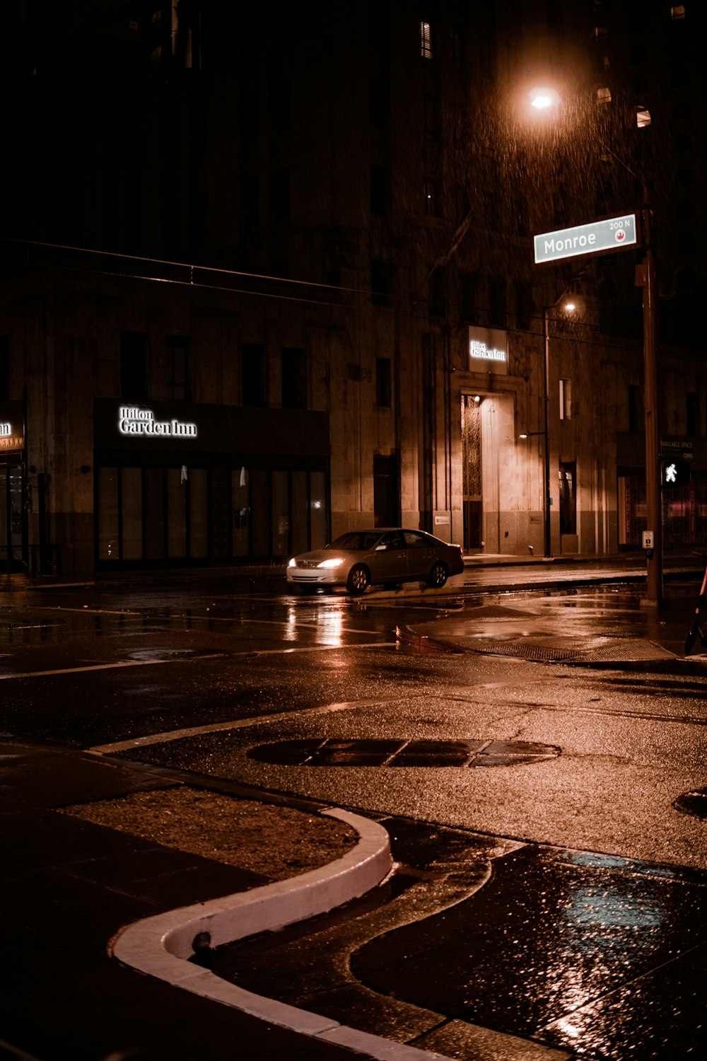 black car on road during night time