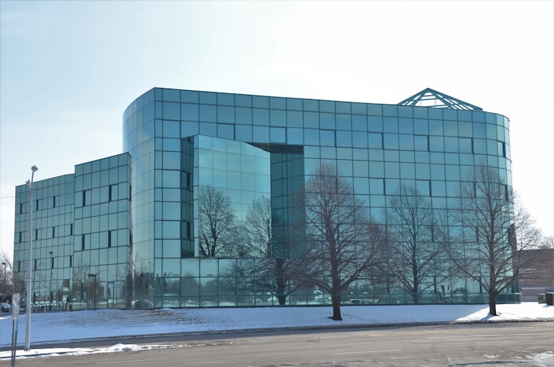 Modern commercial building - Photo by Roger Starnes Sr on Unsplash