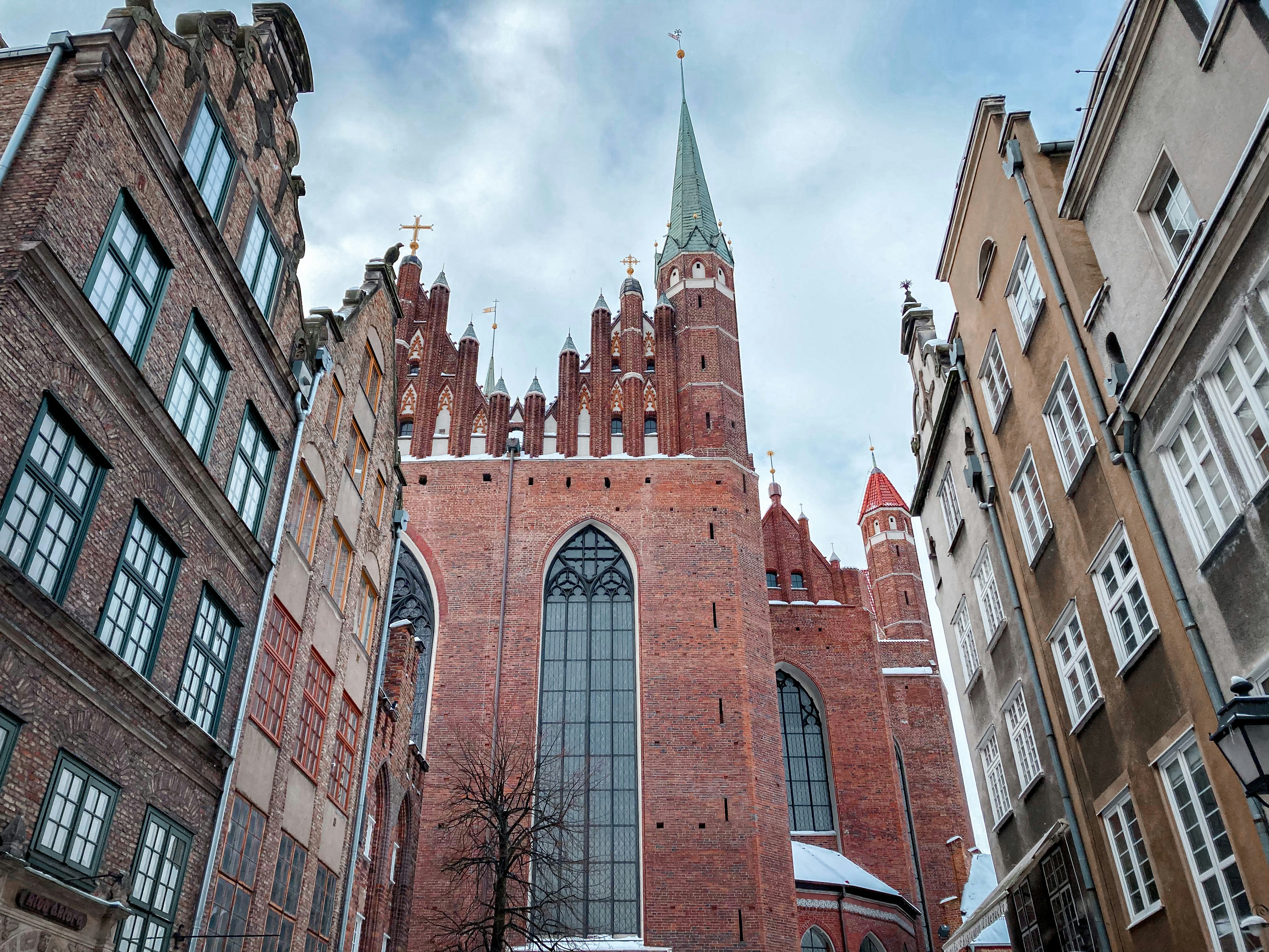 brown concrete building under blue sky during daytime