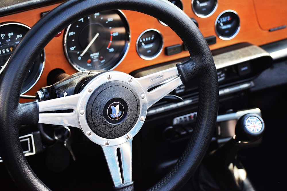 black and silver mercedes benz steering wheel