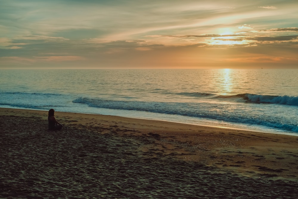 body of water during sunset