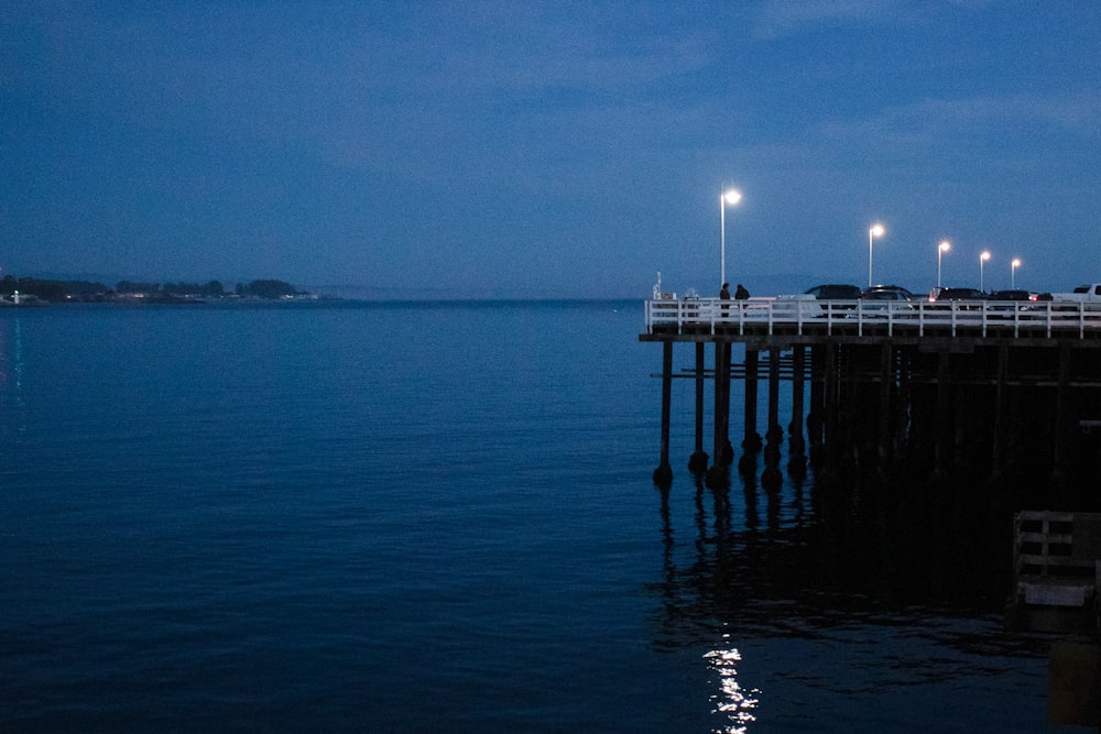 dock on body of water during daytime