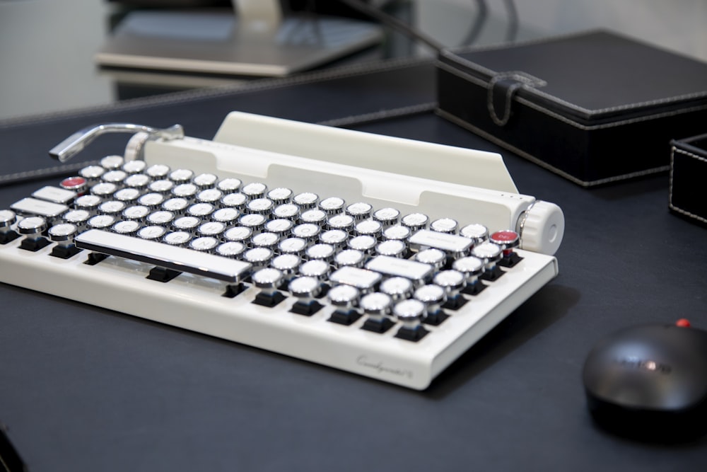 white and black braille typewriter