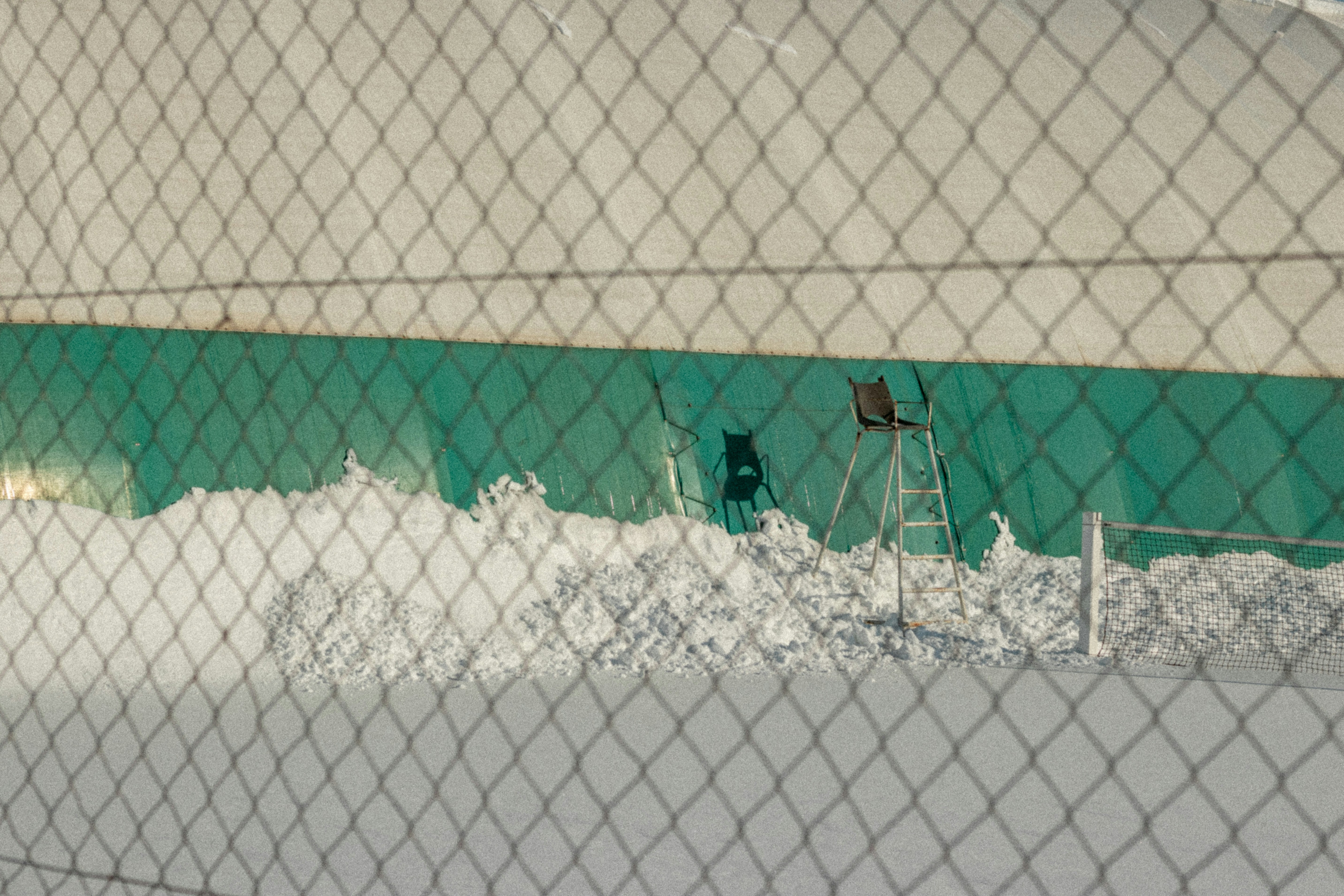 white and blue metal fence