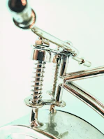 Various types of springs displayed side by side highlighting their unique shapes and finishes.