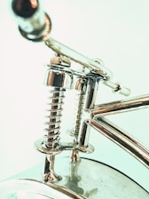 Close-up of high strength steel handcuffs with polished finish.