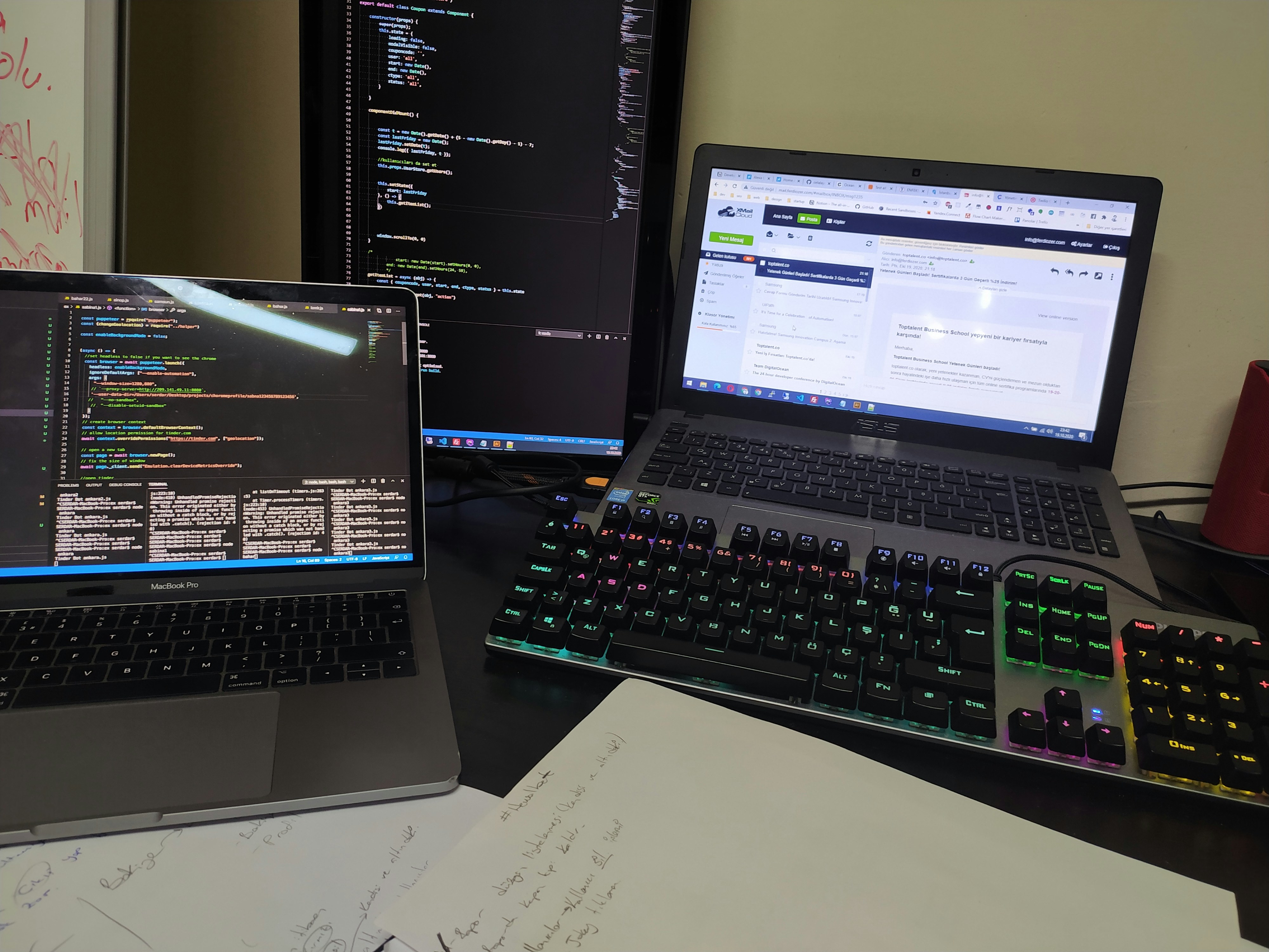 Modern laptops including MacBook Pro, ThinkPad, and gaming laptops displayed for comprehensive performance testing