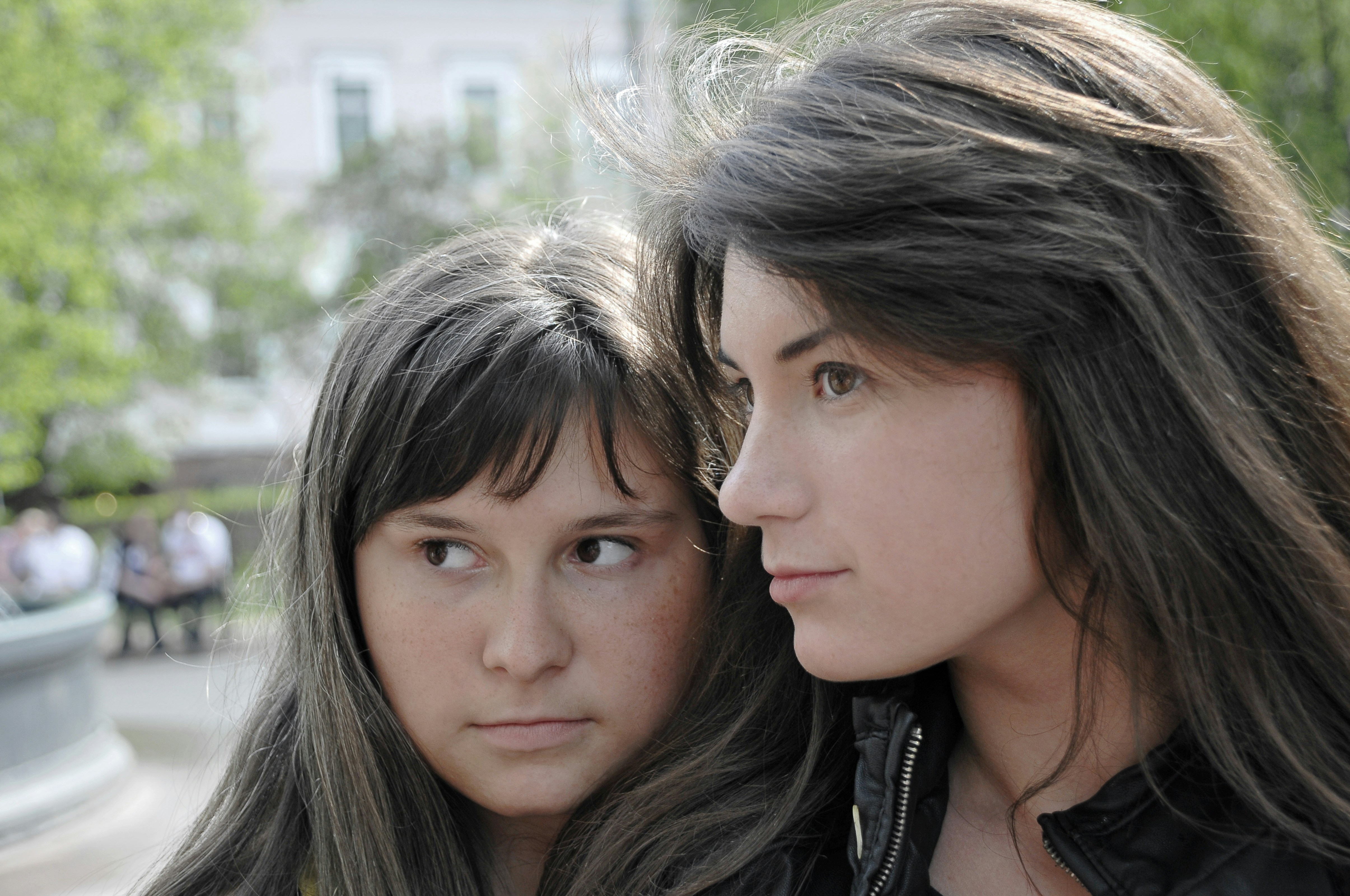 2 women with black hair