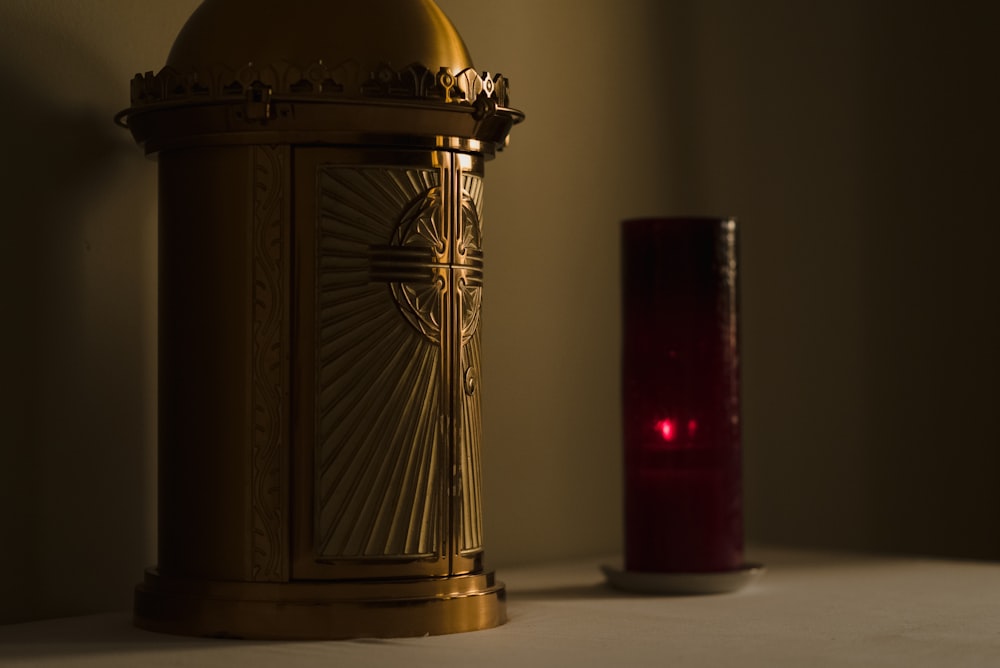 brown wooden lantern on white table