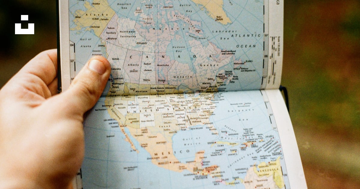 Person holding map chart paper photo – Free Grey Image on Unsplash