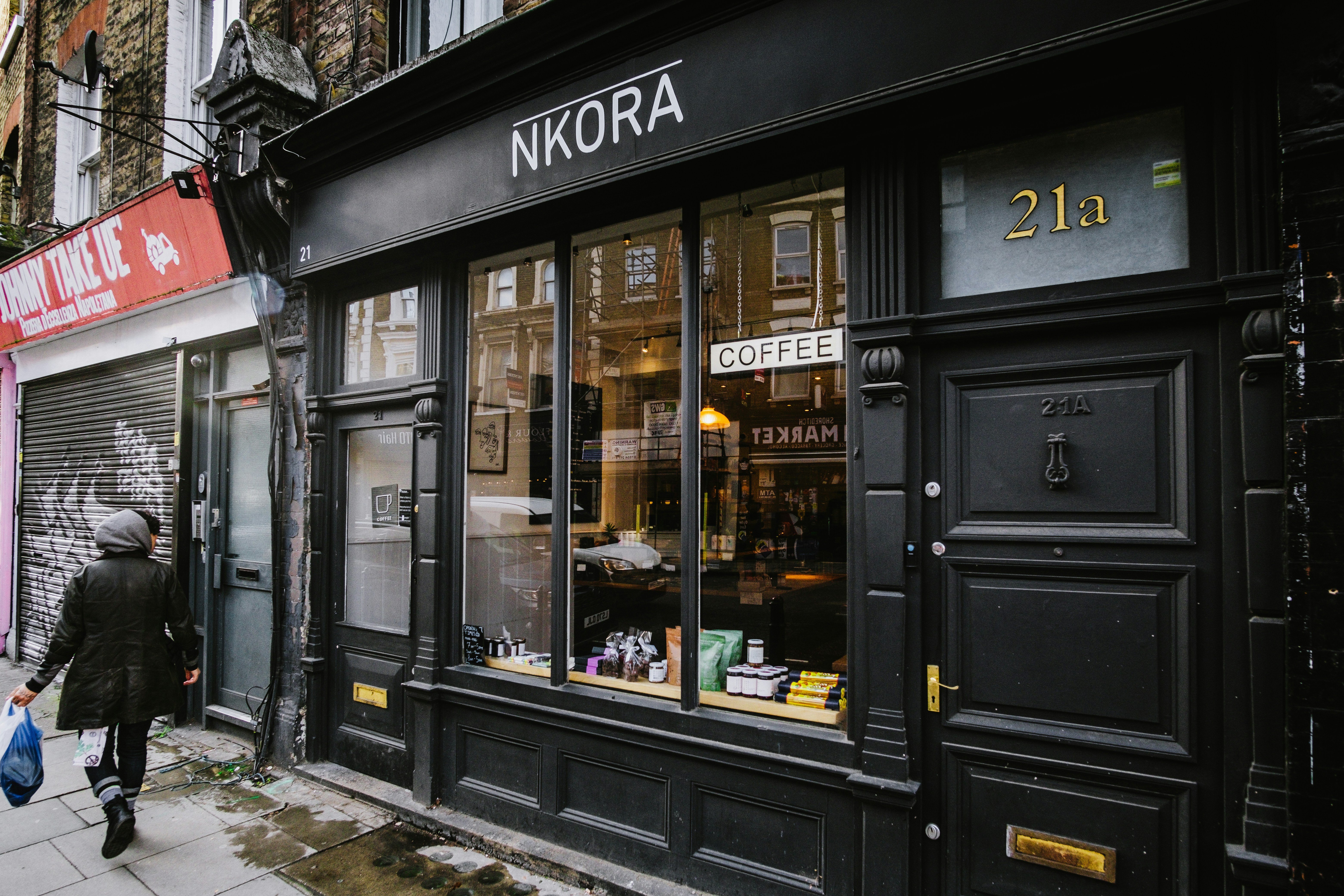 Black and white store front during daytime photo Free Hackney road
