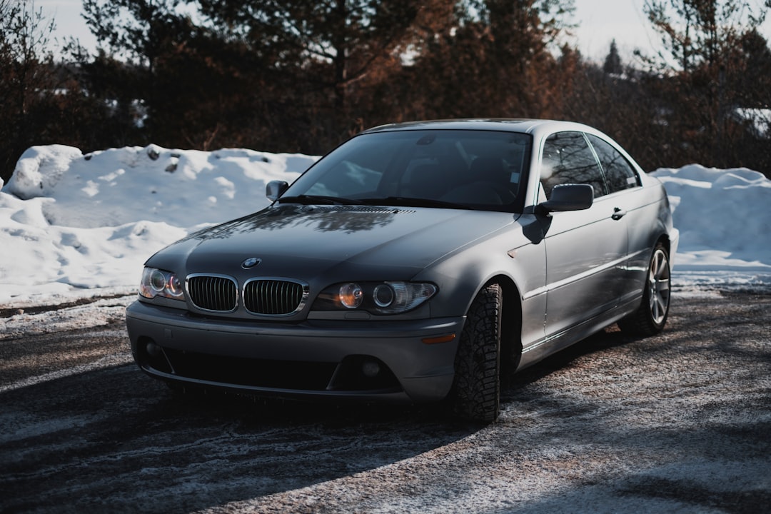 gray bmw m 3 coupe on snow covered ground during daytime