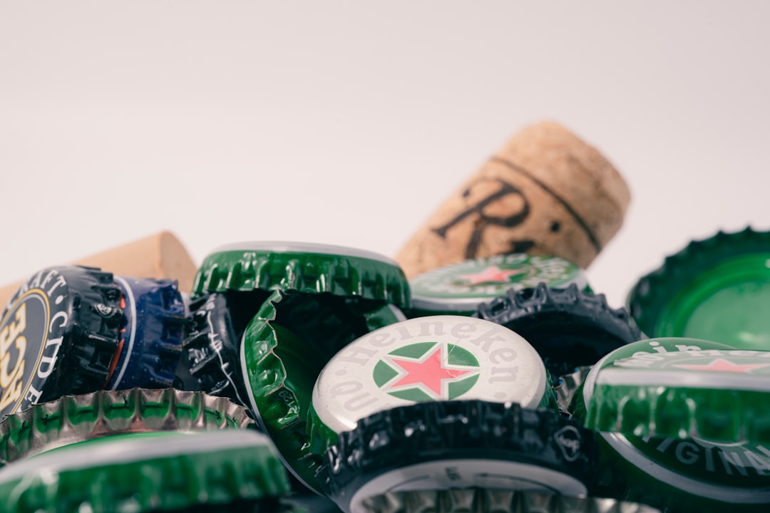 green and white bottle cap