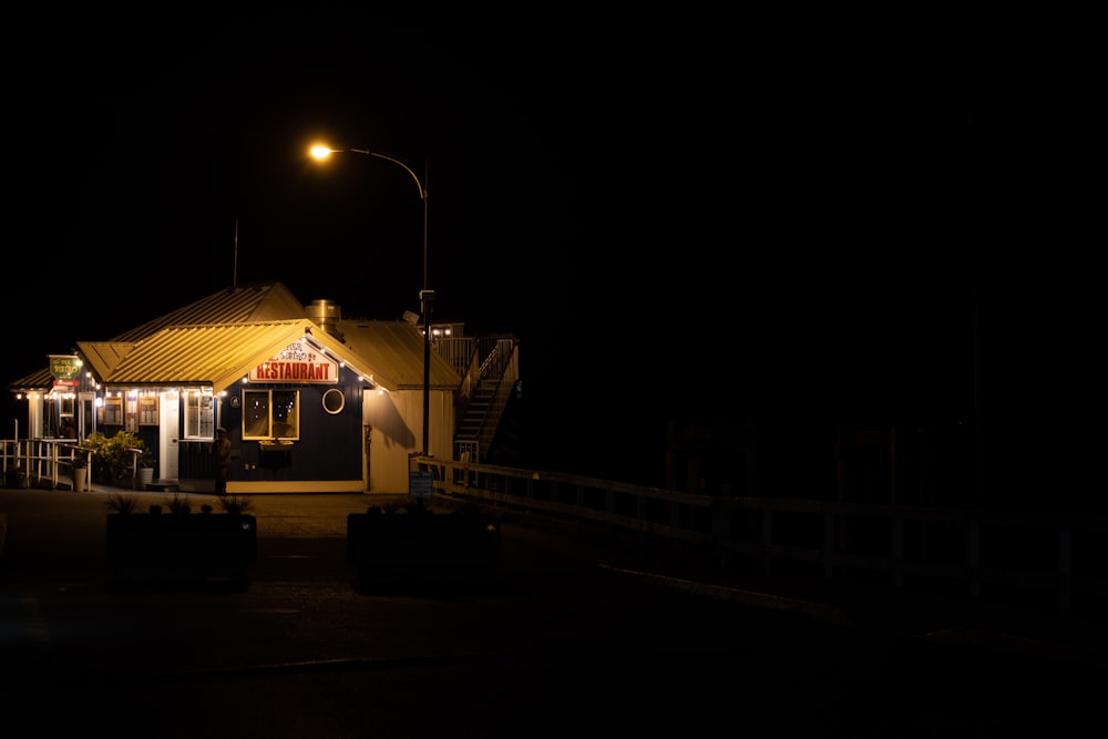 white and brown tent during night time