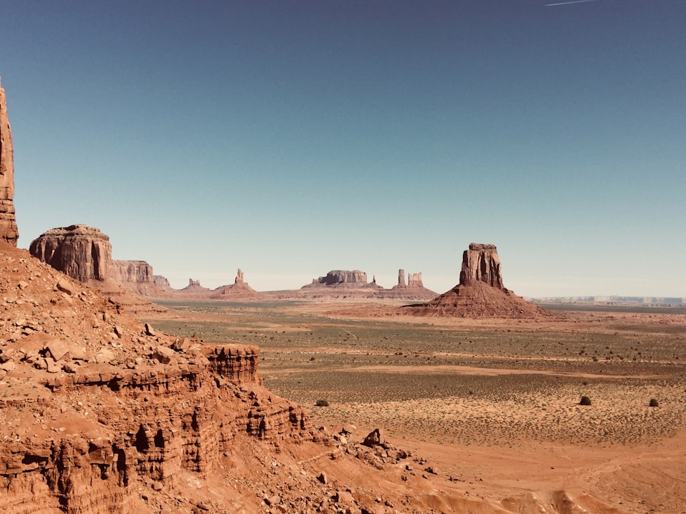 brown rock formation under blue sky during daytime