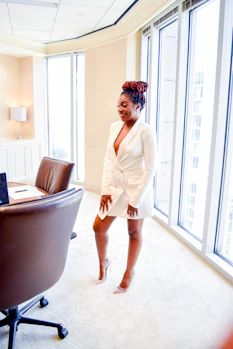 Portrait of a confident female lawyer in a modern office setting.