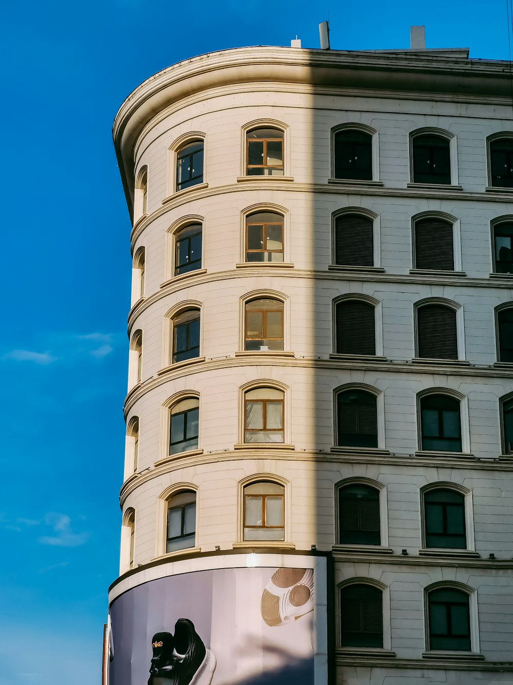 white concrete building under blue sky during daytime