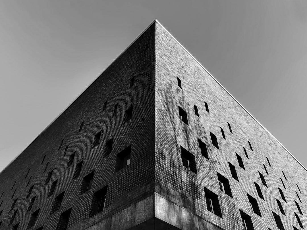 grayscale photo of concrete building