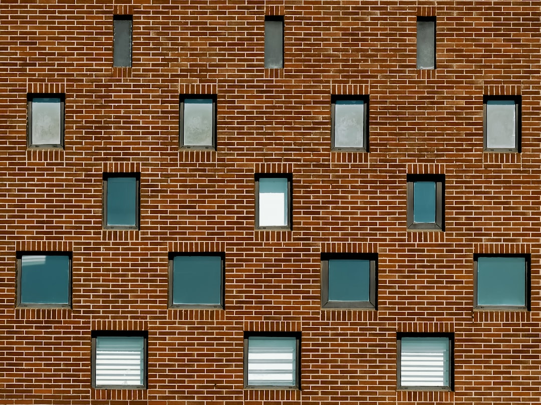 brown brick wall with brown wooden frame