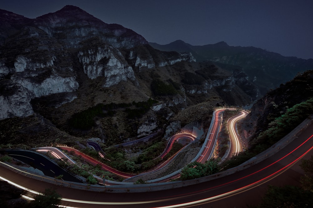 time lapse photography of cars on road during night time