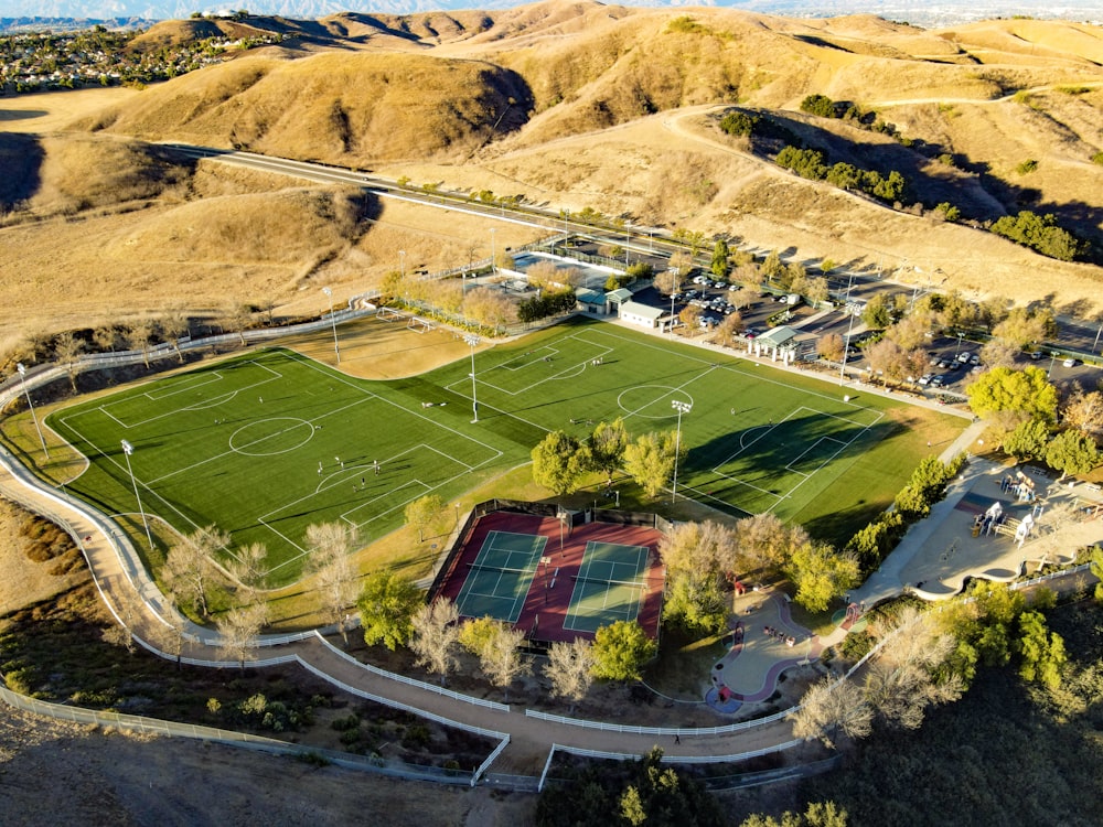 aerial view of green and brown field during daytime