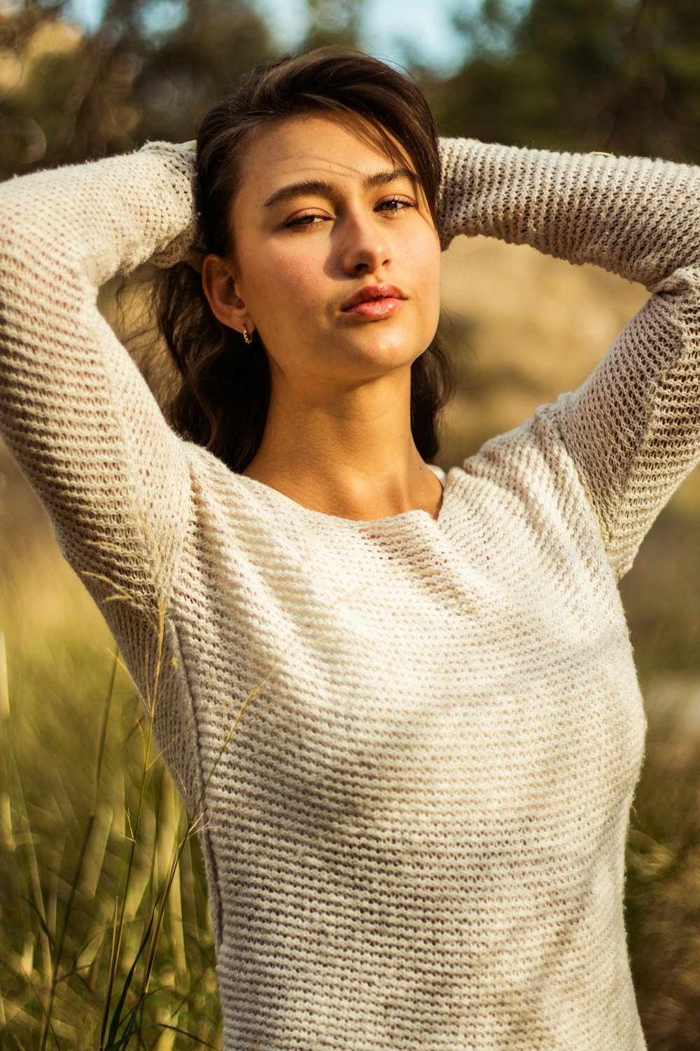 woman in white long sleeve shirt