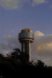 blue and white round building under blue sky