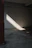 A bright, clean basement with sunlight streaming in, showing a fresh, odor-free space.